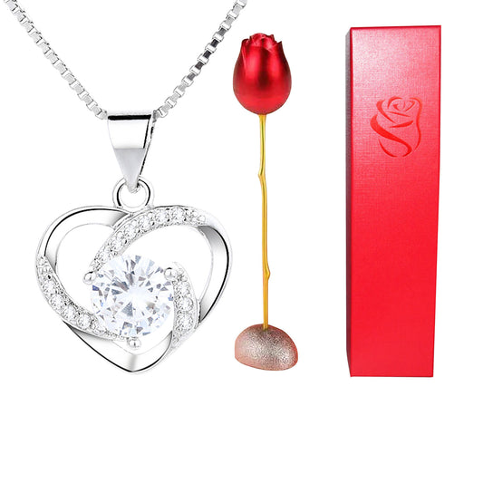 Heart-shaped silver pendant with a red rose and a red box on a white background