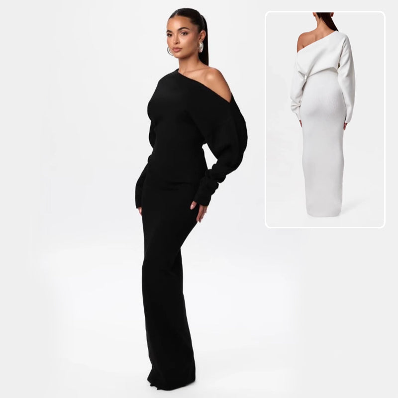 Black one-shoulder jumpsuit worn by a model on a white background
