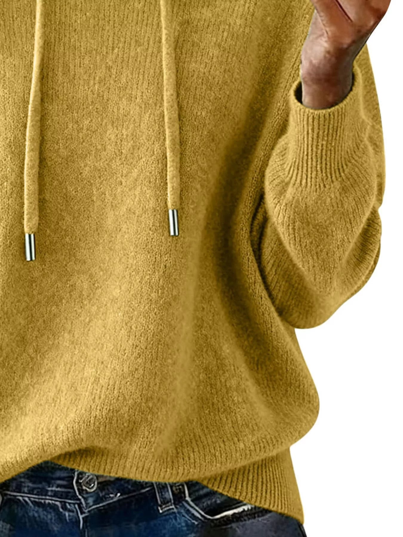 Yellow hoodie worn by a person on a white background