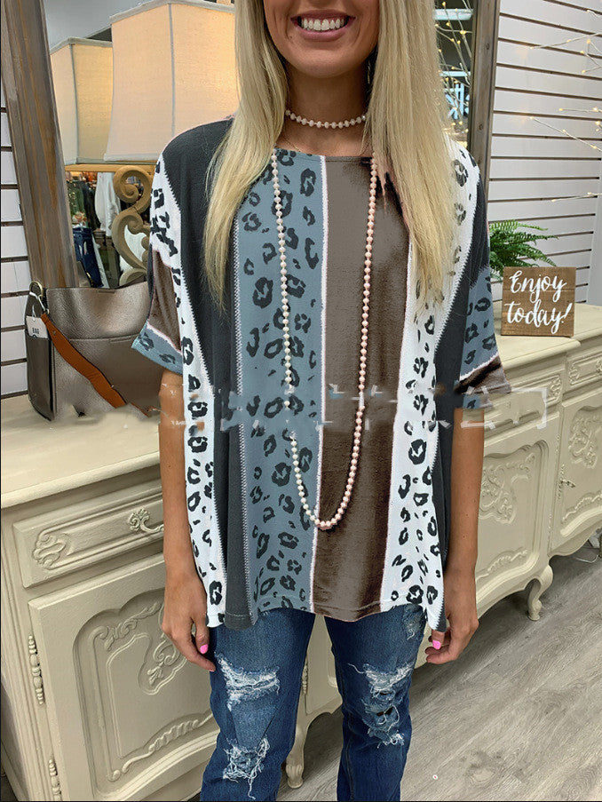 Woman wearing a patterned cardigan with a neutral background