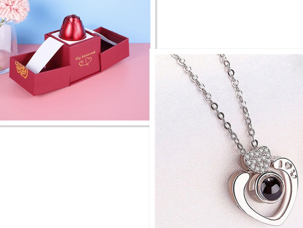 Heart-shaped pendant necklace with a red box on a pink surface