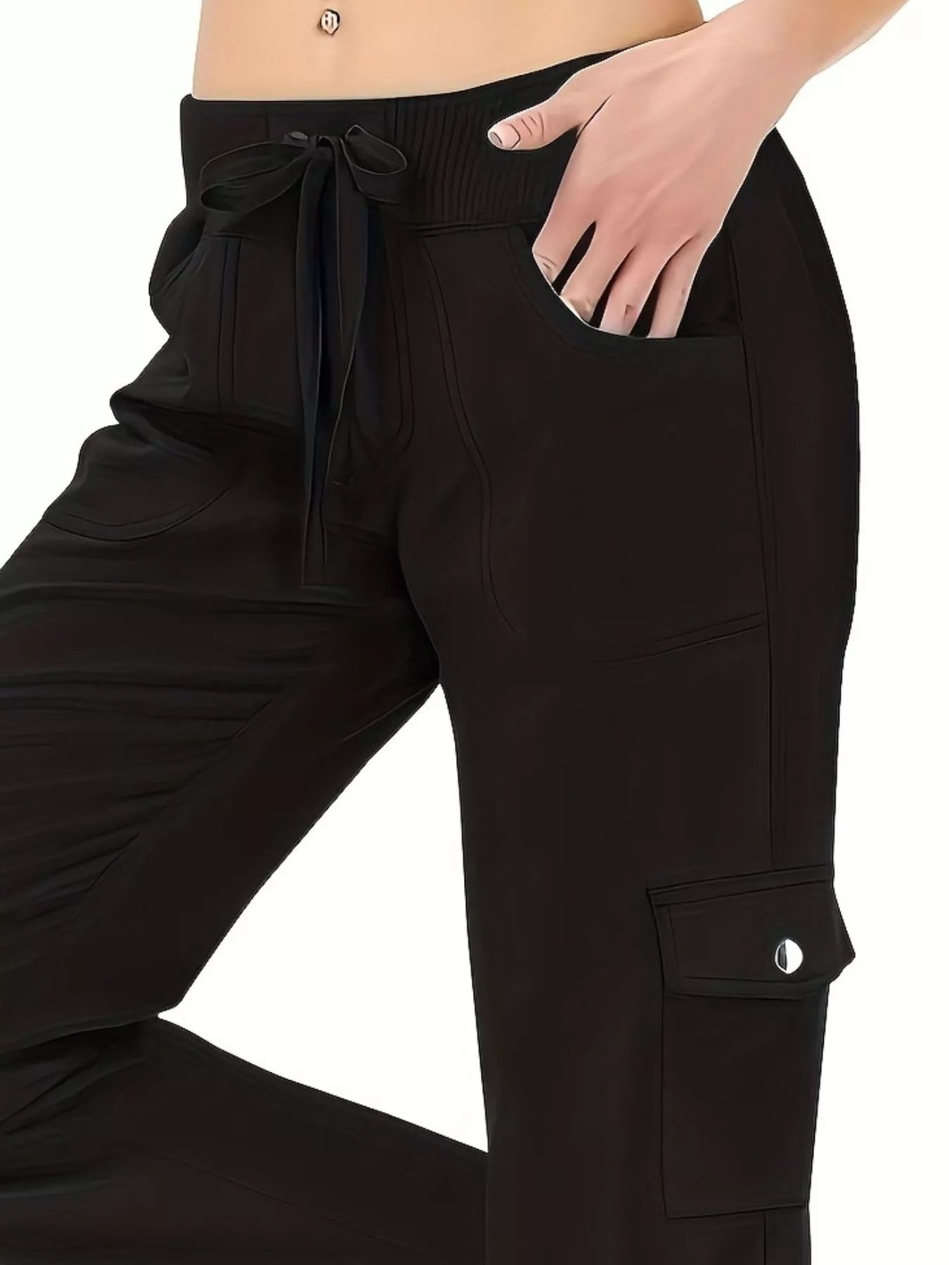 Black cargo pants with a drawstring waist on a white background