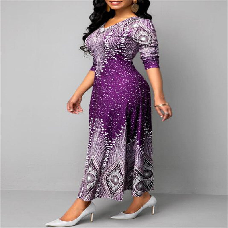 Woman wearing a purple and white patterned dress on a gray background