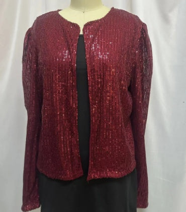 Red sequin cardigan on a mannequin against a white background