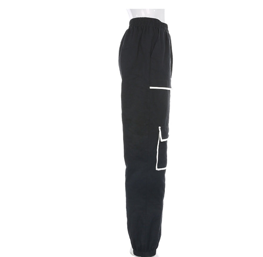 Black jogger pants with white accents on a white background