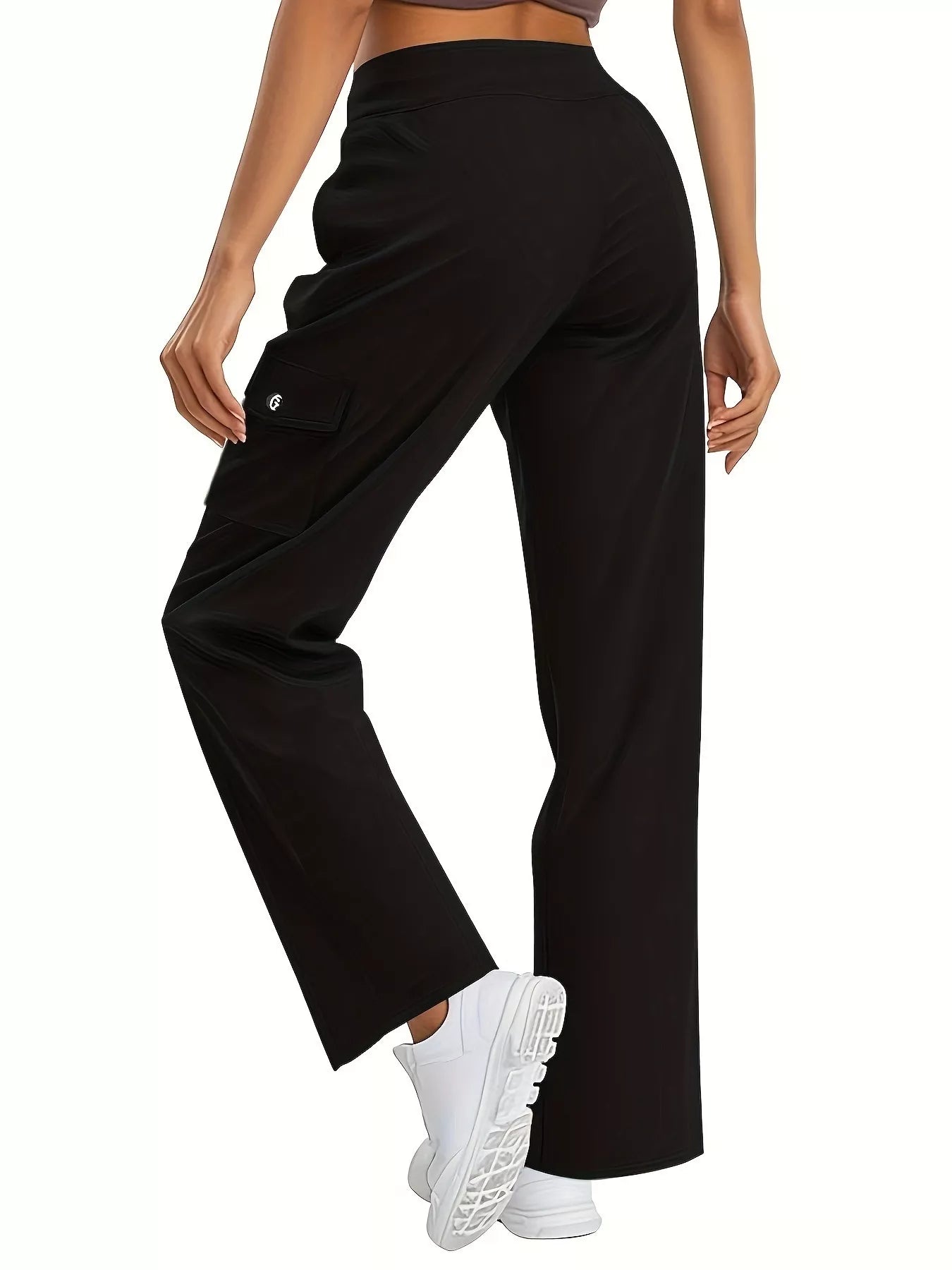Black wide-leg pants worn by a person on a white background