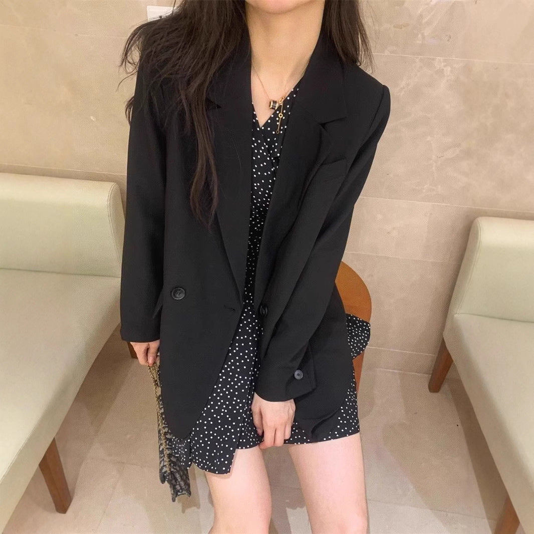 Black blazer mini dress for women styled in a modern Vamp Romantic look, dark feminine street fashion with elegant layered outfit.