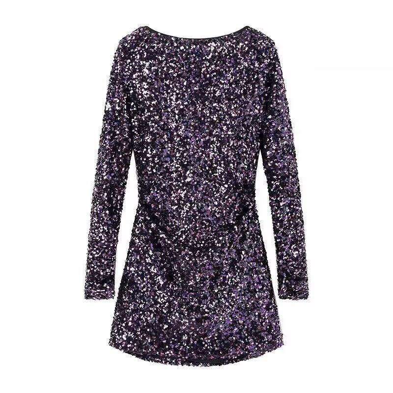 Purple sequin dress with long sleeves on a white background