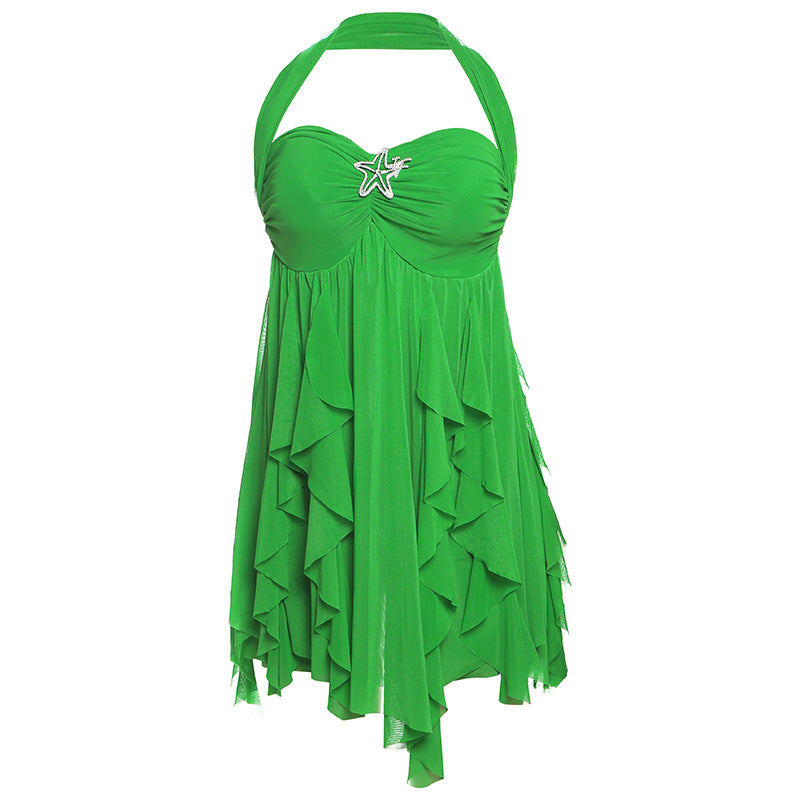Green dress with ruffled layers on a white background