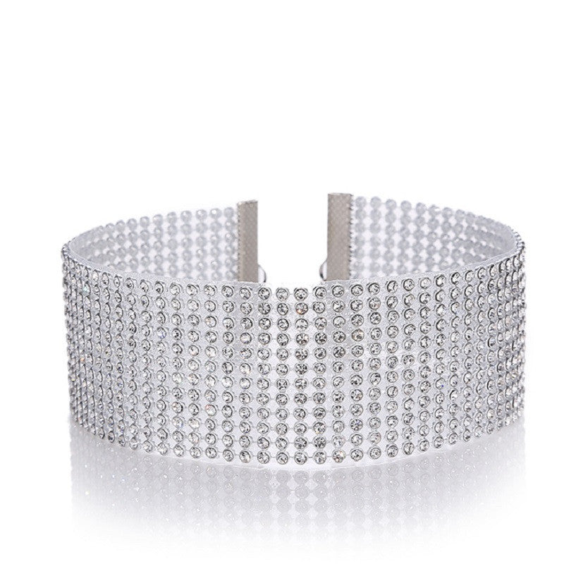 Silver rhinestone choker on a white background