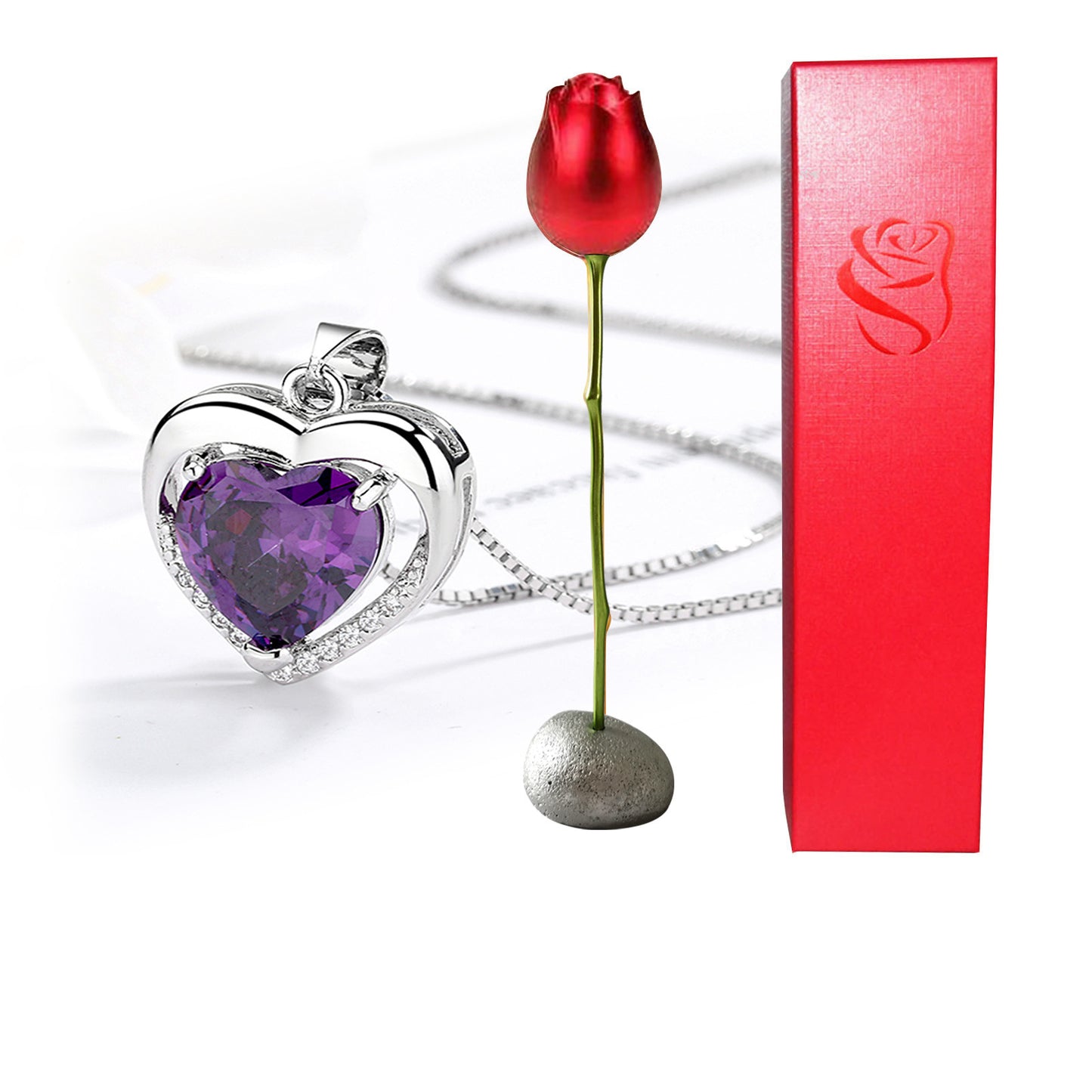 Heart-shaped purple stone pendant with a red rose and red box on a white background