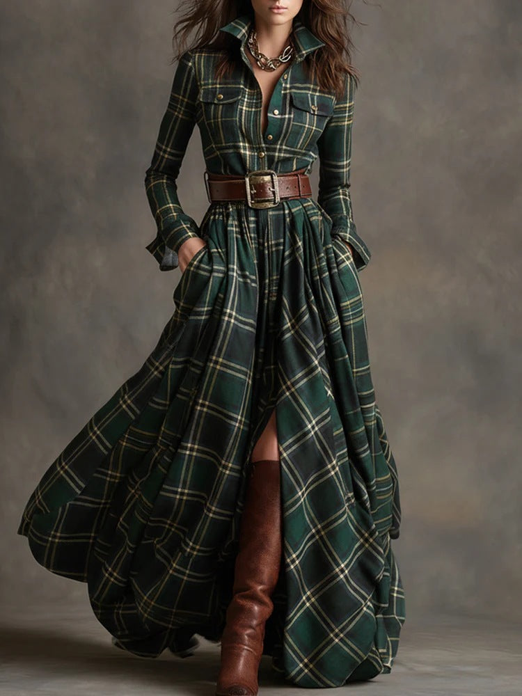 Woman wearing a long green plaid dress with brown boots against a gray background