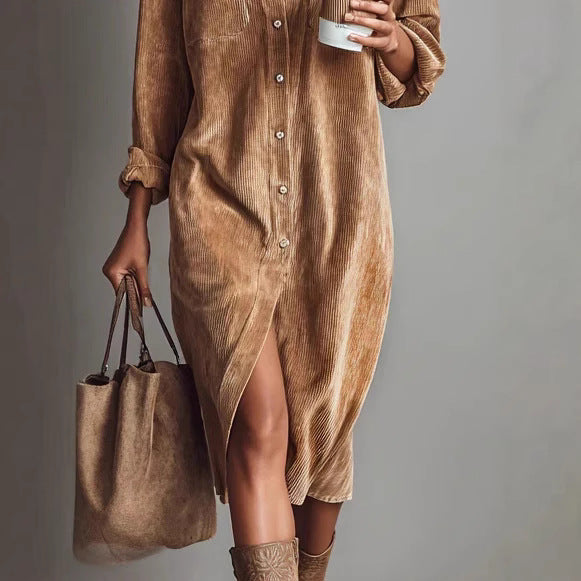 Person wearing a brown corduroy dress holding a matching handbag against a gray background