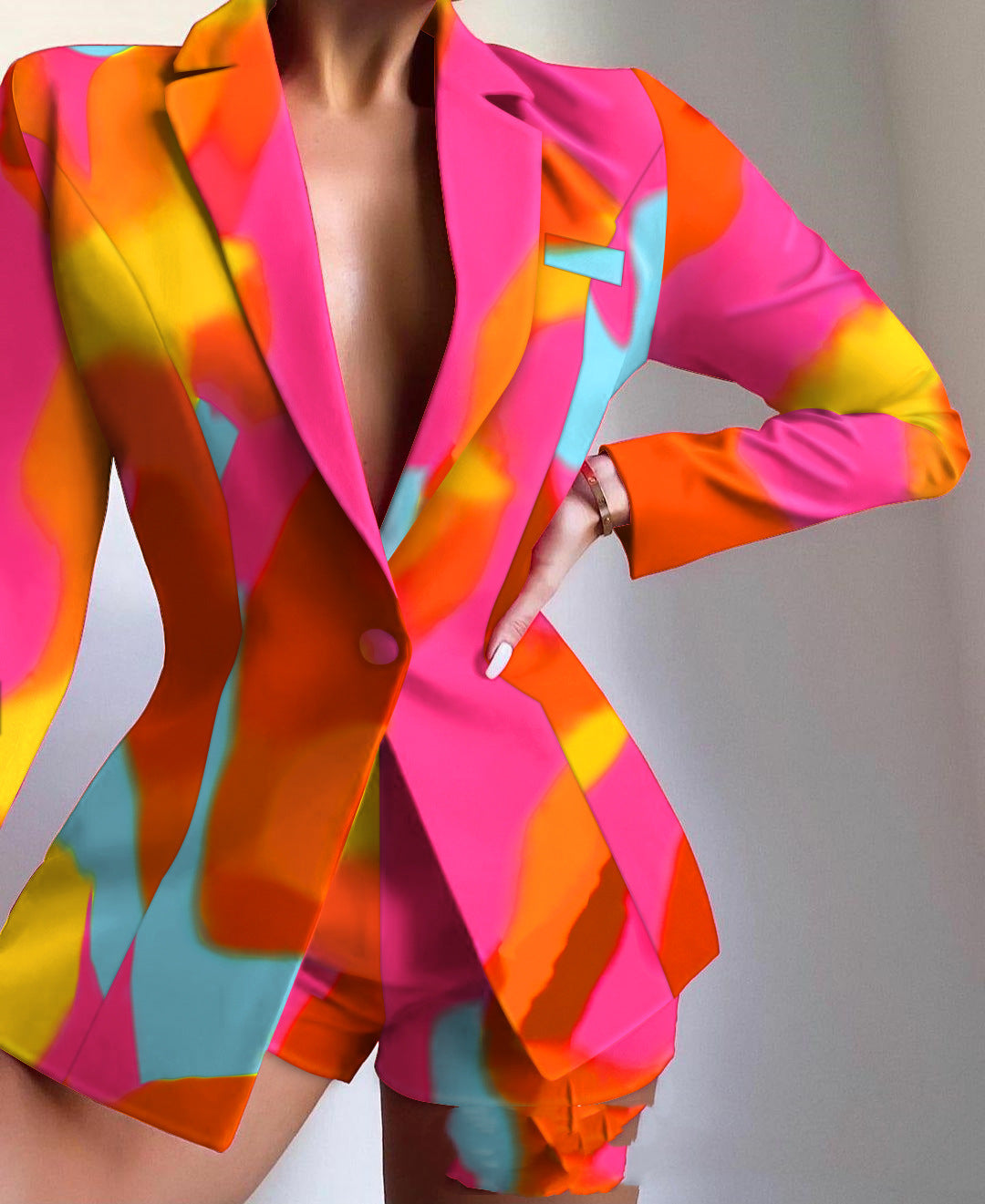 Colorful suit jacket with a vibrant pattern on a plain background