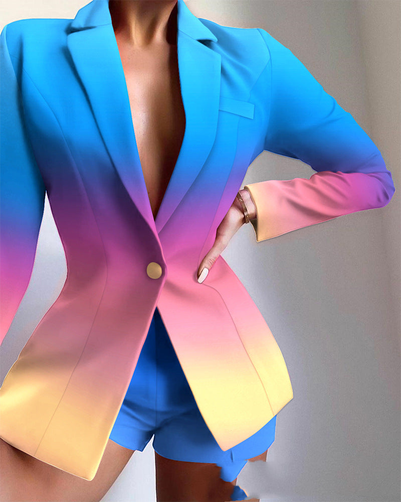 Gradient blazer transitioning from blue to pink to yellow on a neutral background