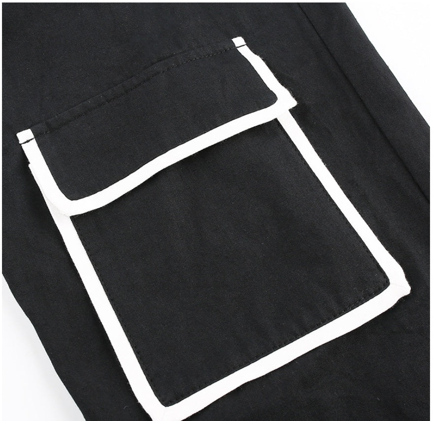 Black apron with white geometric design on a white background