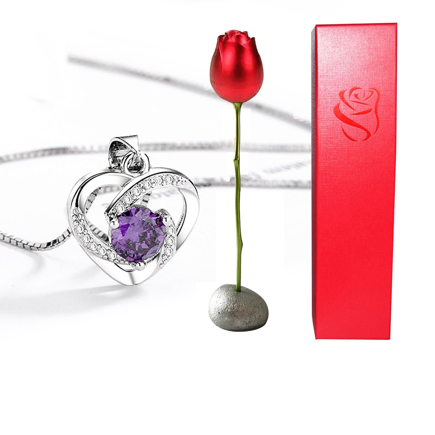 Heart-shaped necklace with purple gem, red rose-shaped pendant, and red box on white background