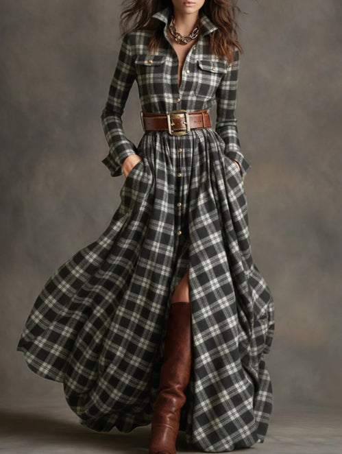 Long plaid dress with a belt and brown boots on a gray background