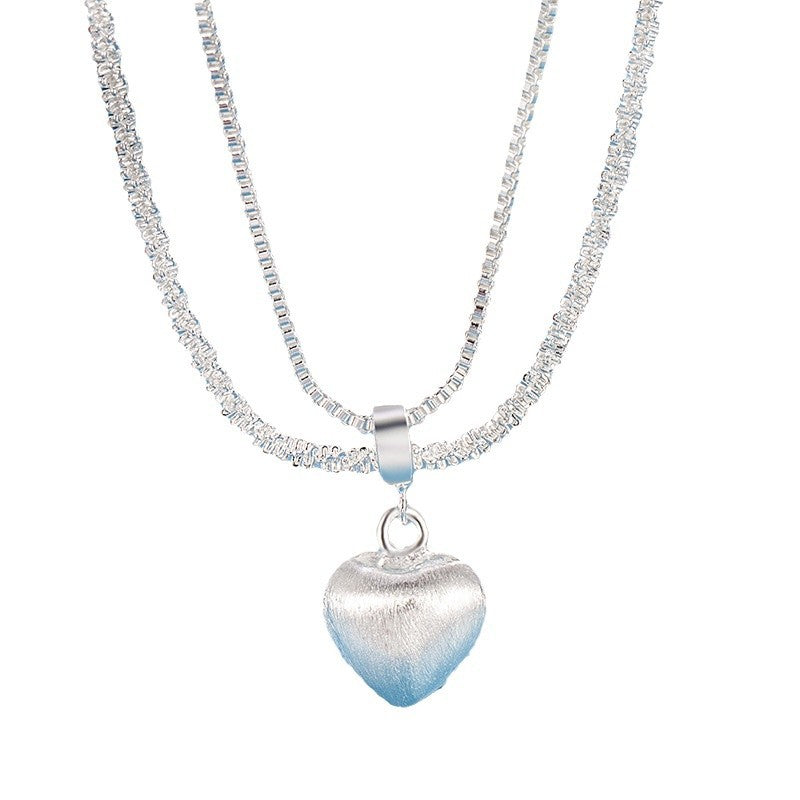 Necklace with a heart-shaped pendant on a white background