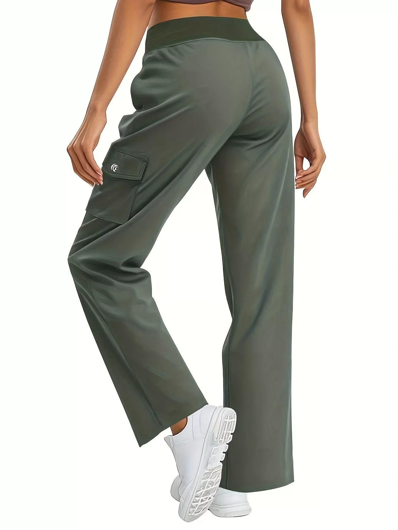 Green wide-leg pants worn by a person on a white background