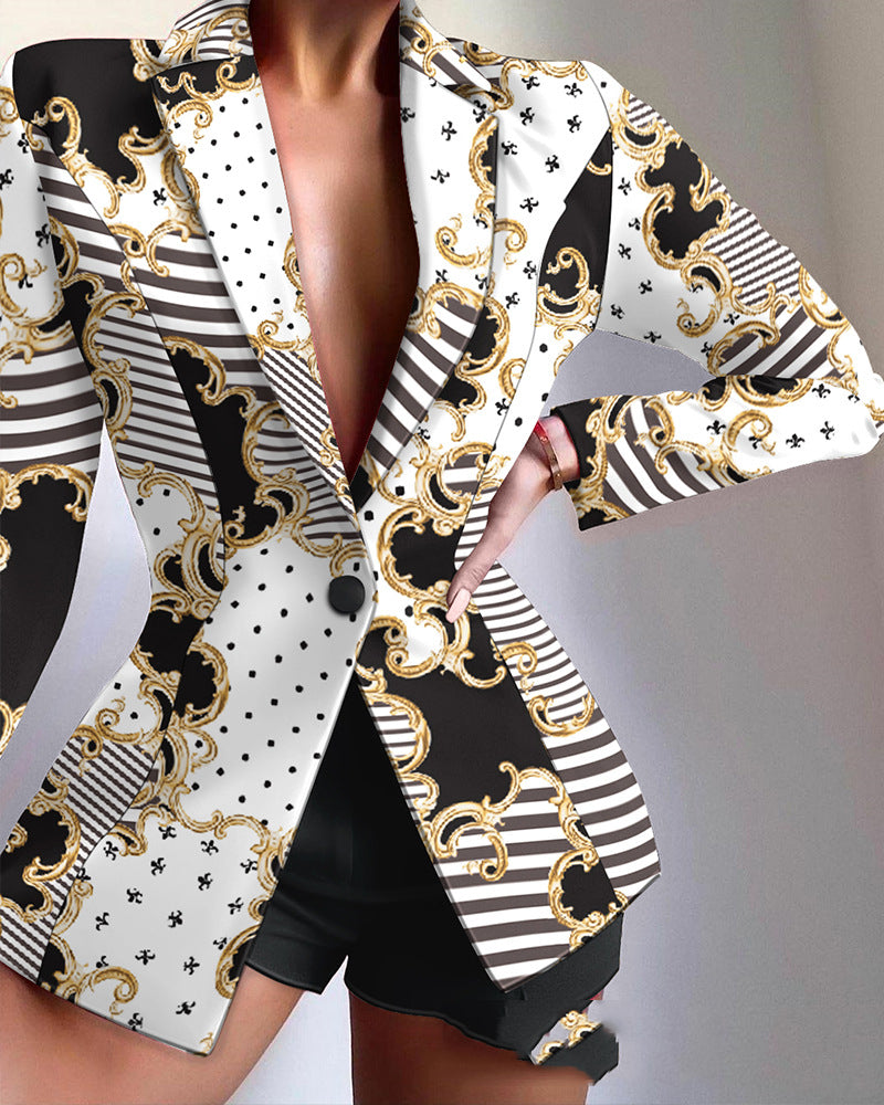Black, white, and gold patterned jacket on a neutral background