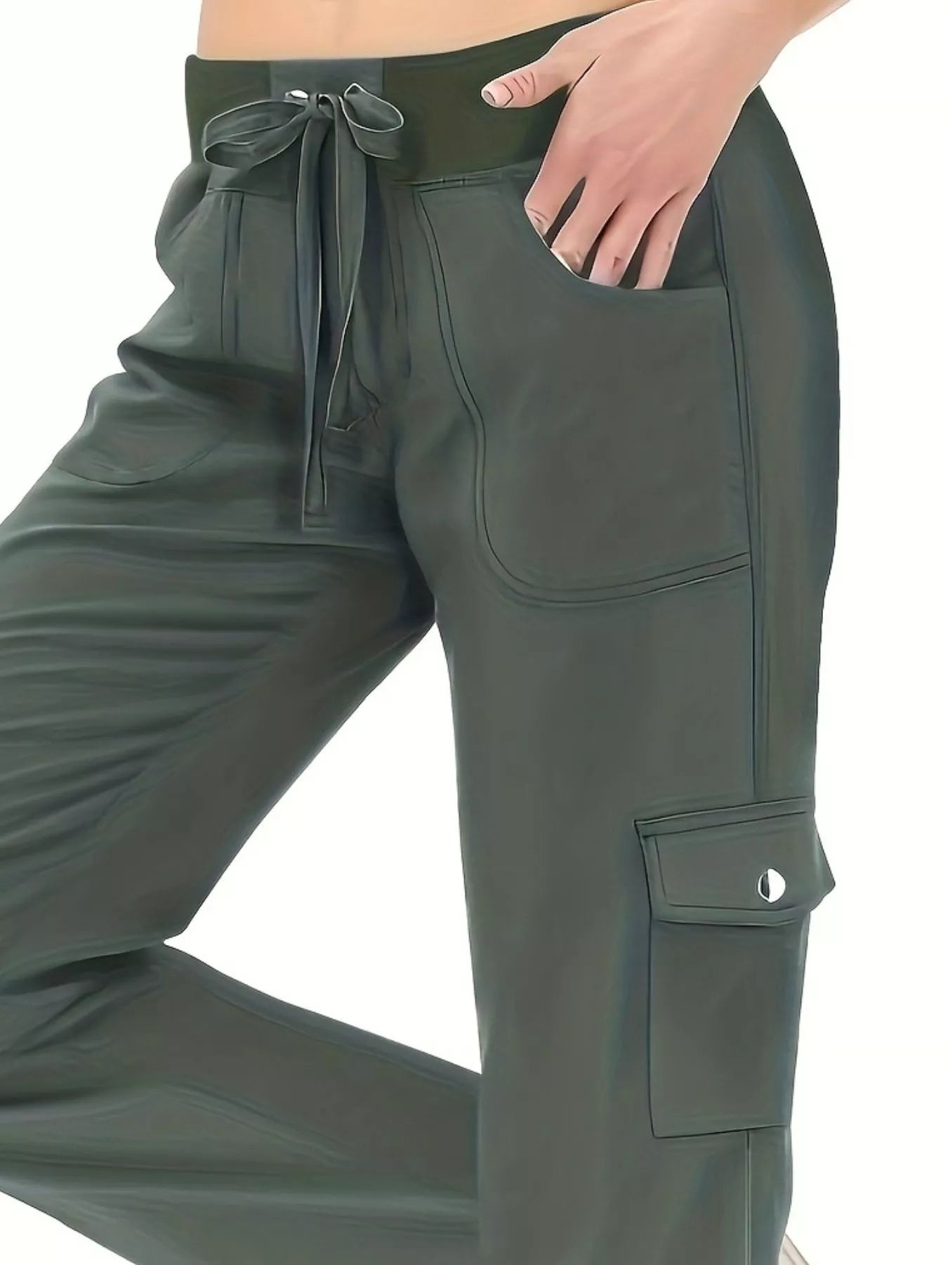 Green cargo pants with a drawstring waist on a white background