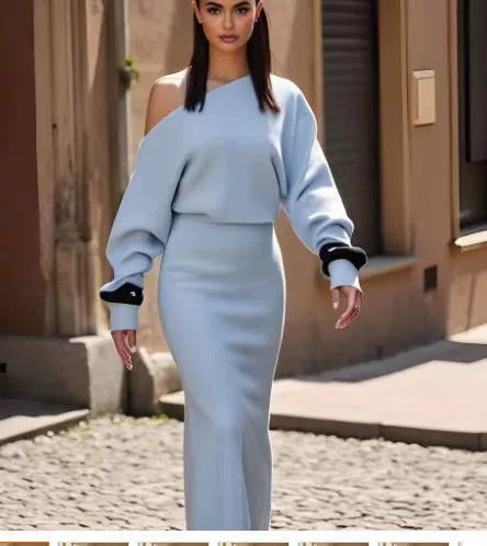 Woman wearing a light blue outfit walking outdoors on a sunny day.