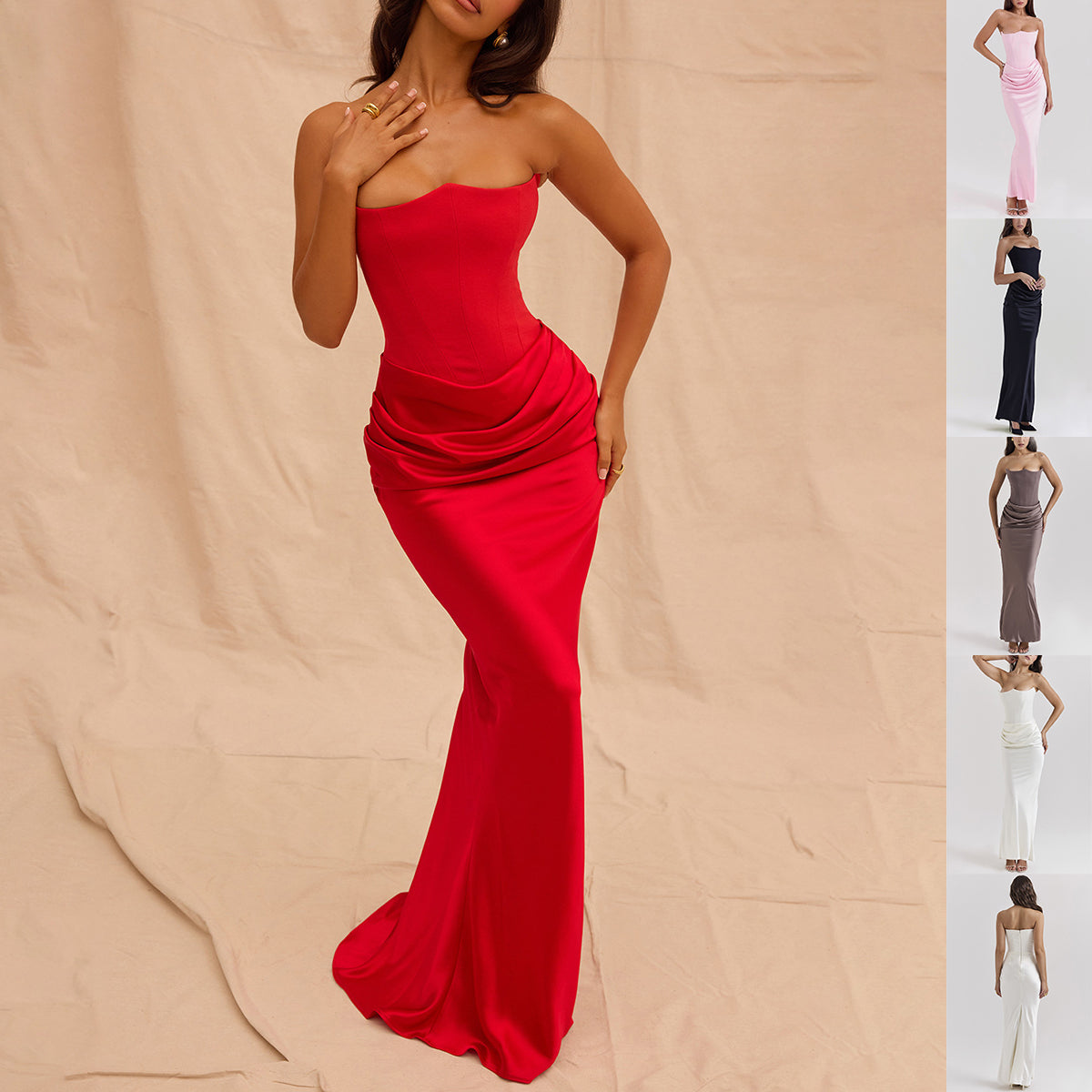 Red strapless gown on a beige background with a side view