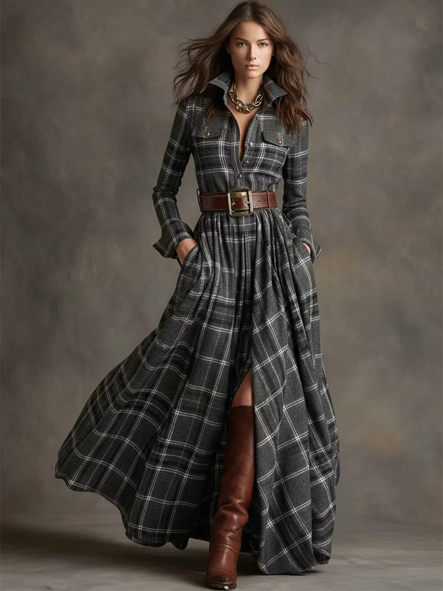 Woman wearing a long plaid dress with brown boots against a gray background