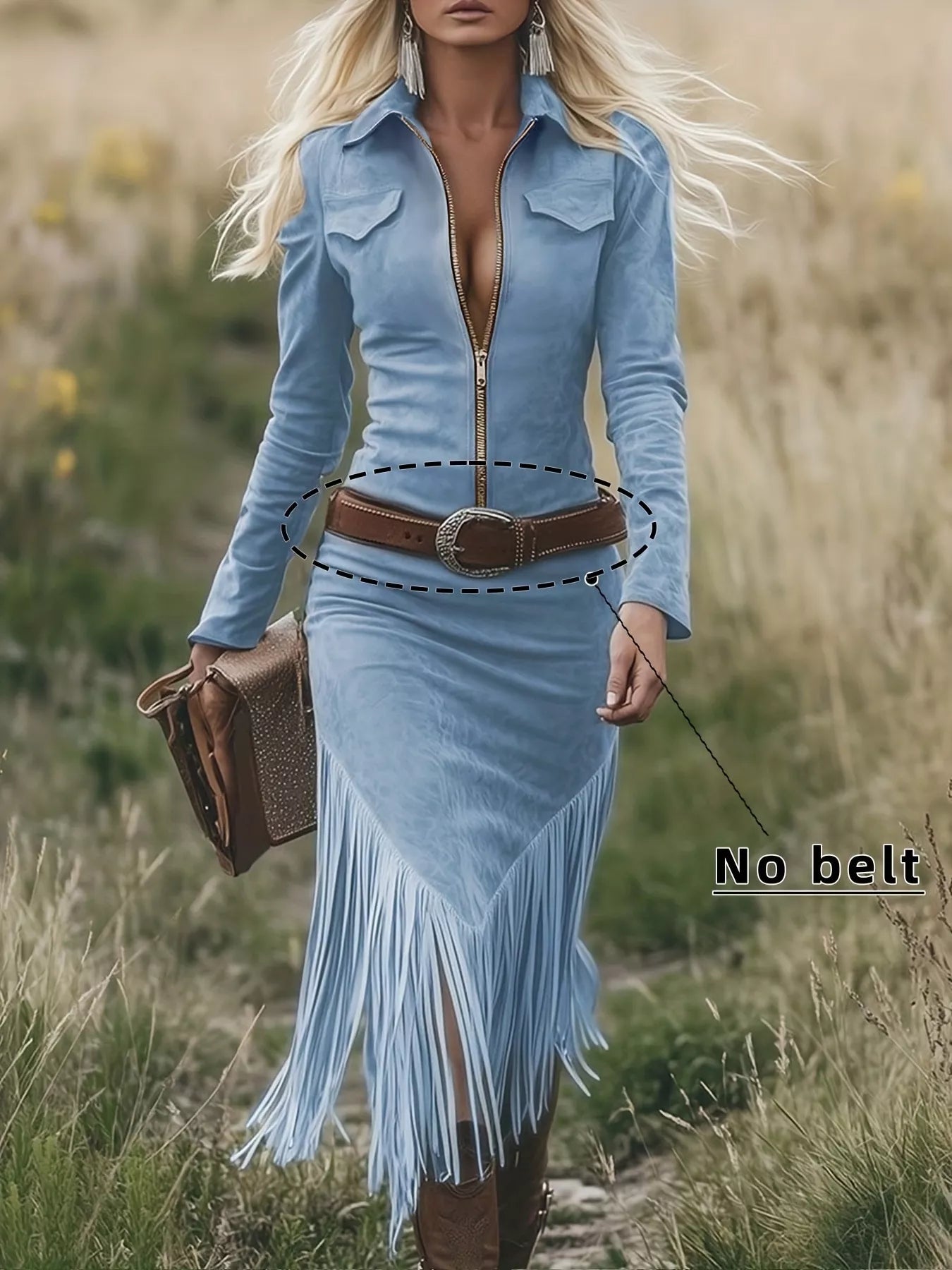 Woman in a blue dress with fringe walking through a field, wearing a brown belt.