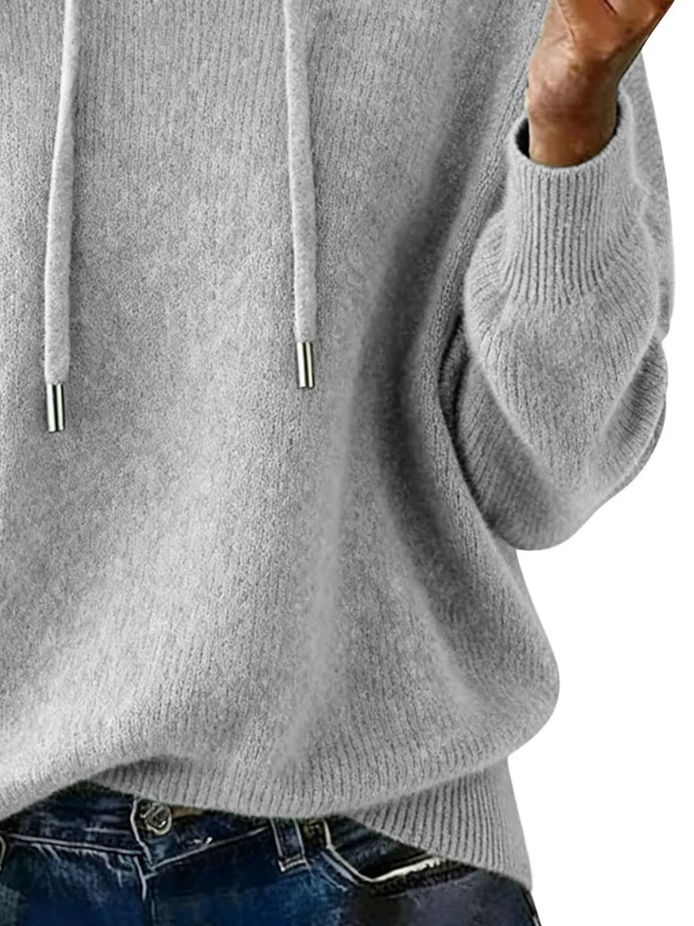 Gray hoodie worn by a person on a white background