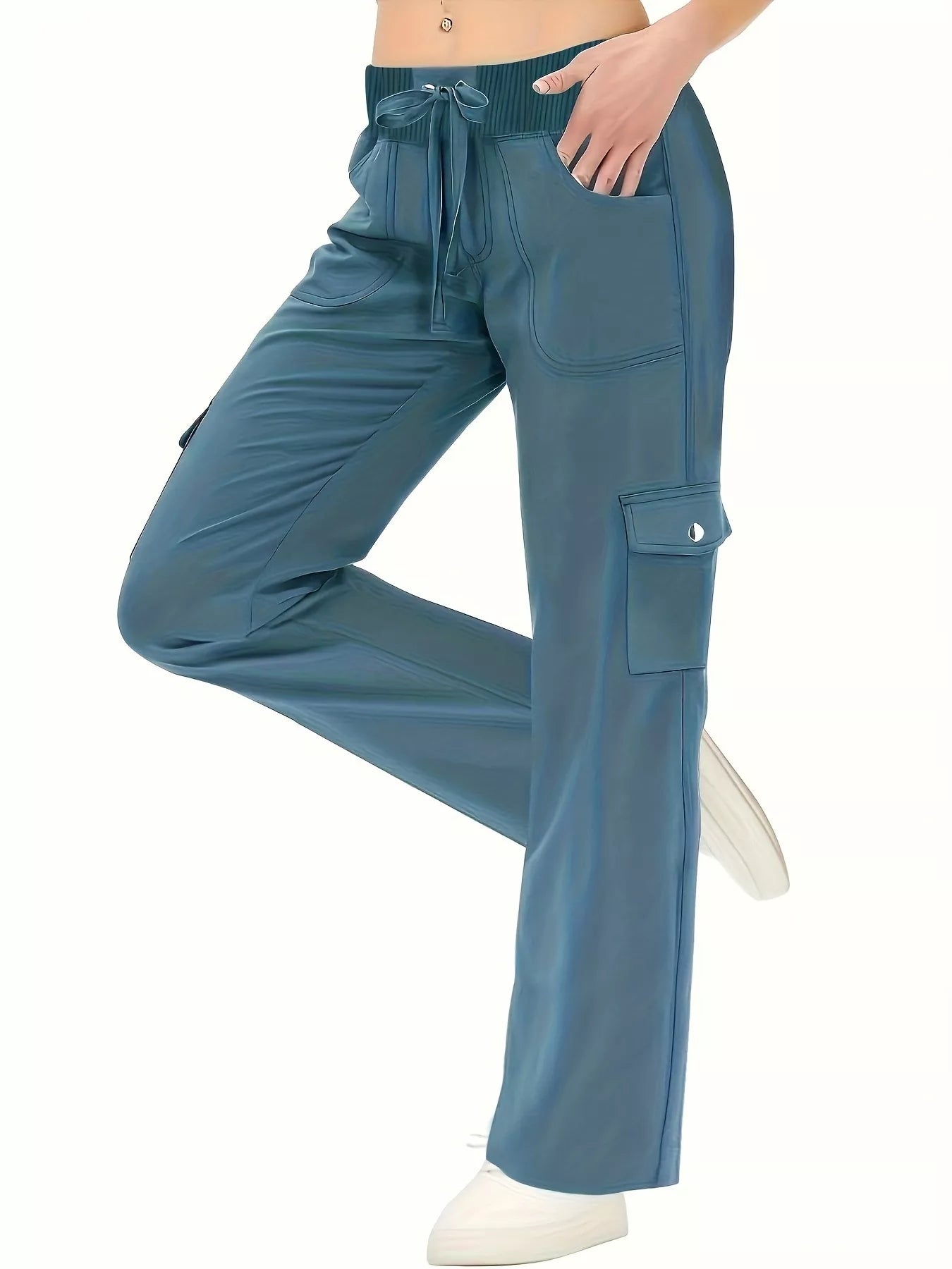 Blue cargo pants with a drawstring waist on a white background