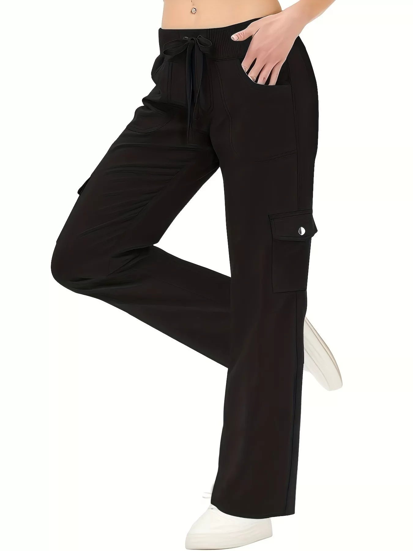Black cargo pants worn by a person on a white background