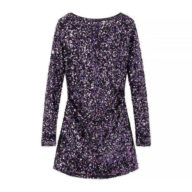 Purple sequin dress on a white background