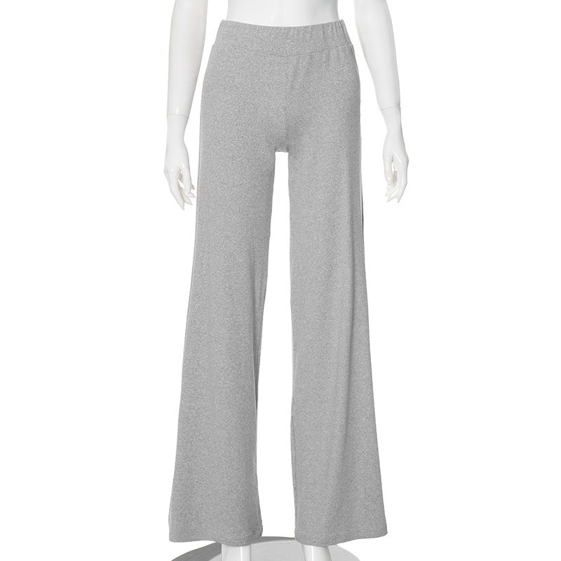 Gray wide-leg pants on a mannequin against a white background